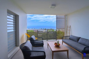 Appt Neuf Leu EMRA est un T2 situé à Saint-Leu avec balcon vue mer
